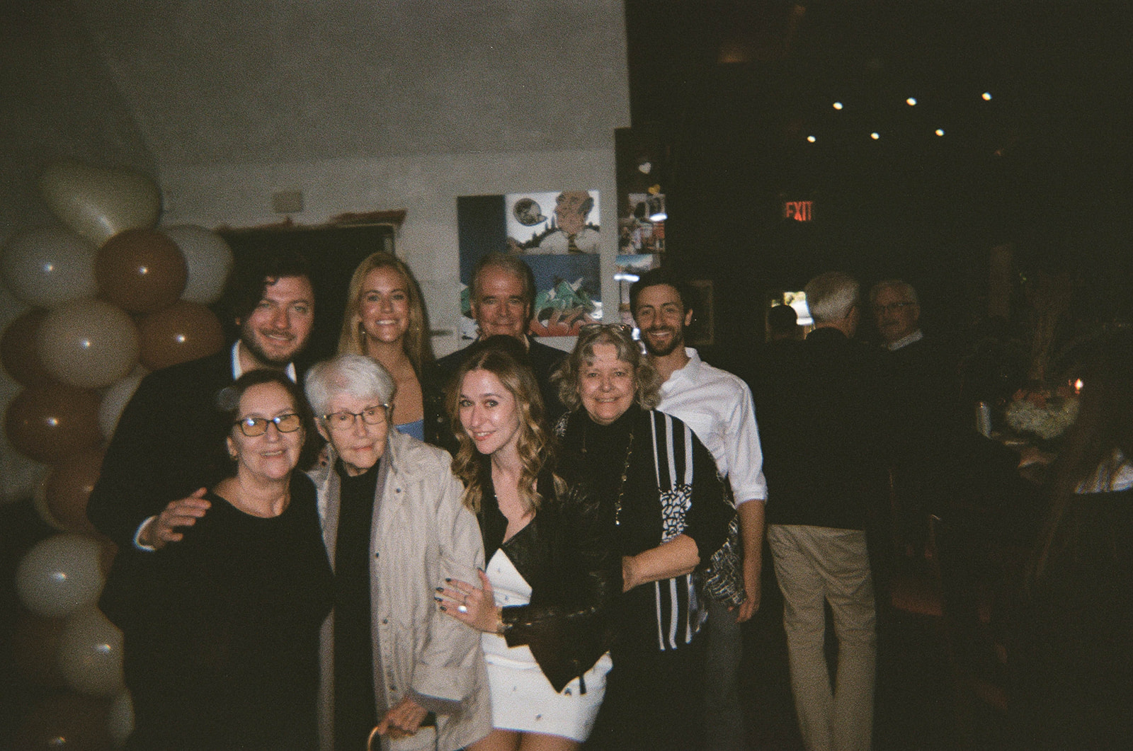 Nancy surrounded by family at Sarah's engagement party, November 2023